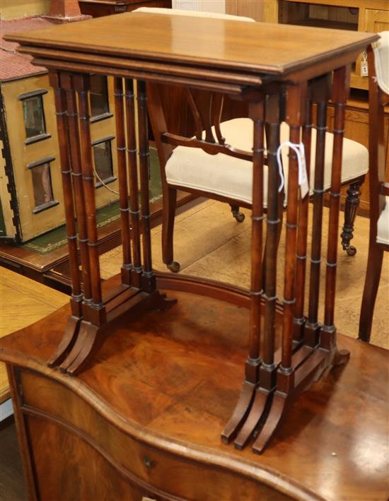 A nest of three late 19th century crossbanded mahogany tables W.49cm